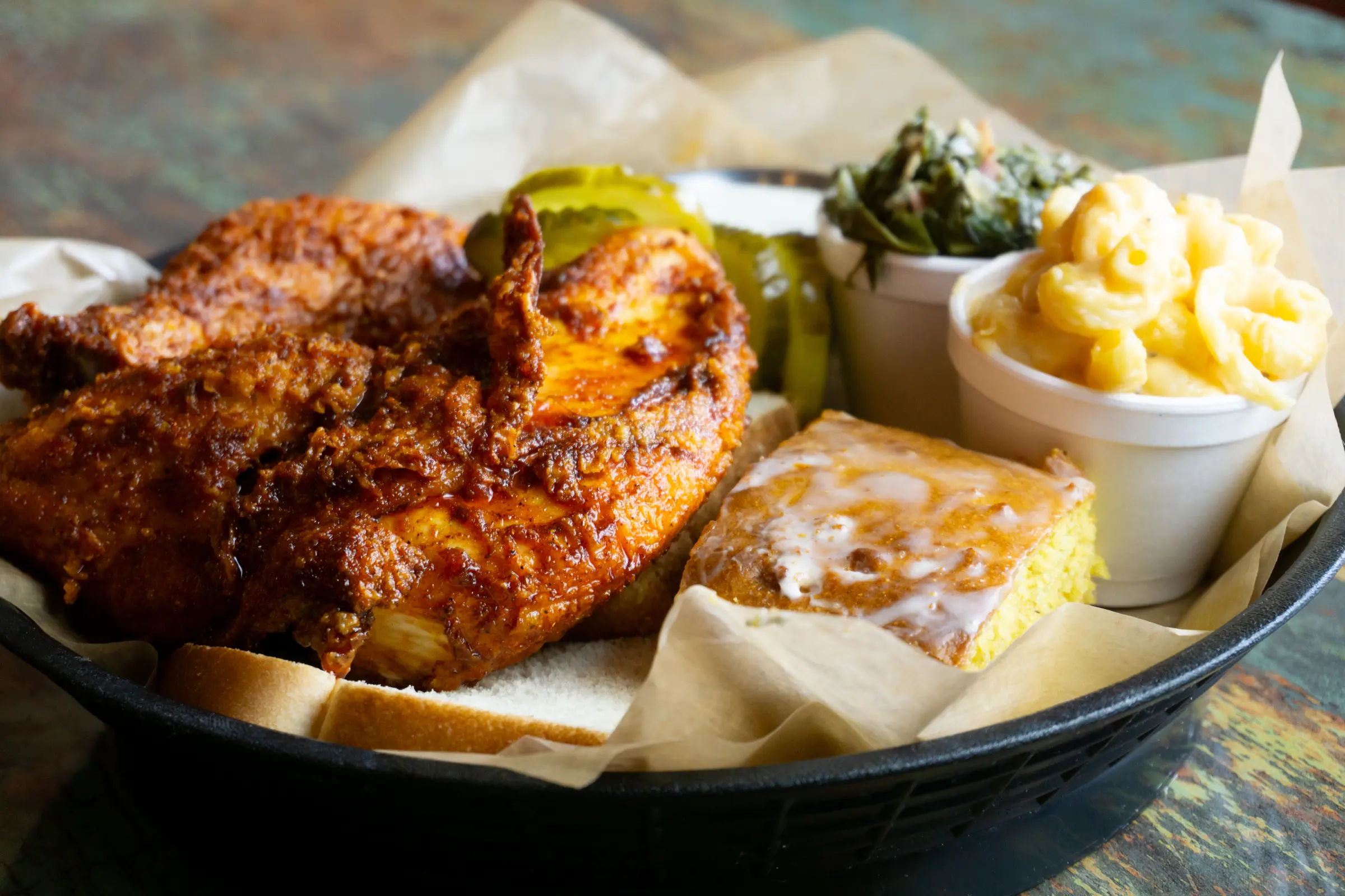 Lamon’s Nashville hot chicken plate with Southern sides and cornbread
